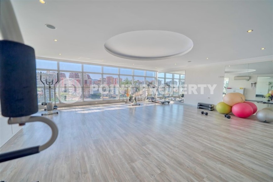 Современная квартира с тремя спальнями и большой открытой террасой, площадью 125 м2, в спокойном районе Аланьи - Джикджилли-id-7030-фото-18