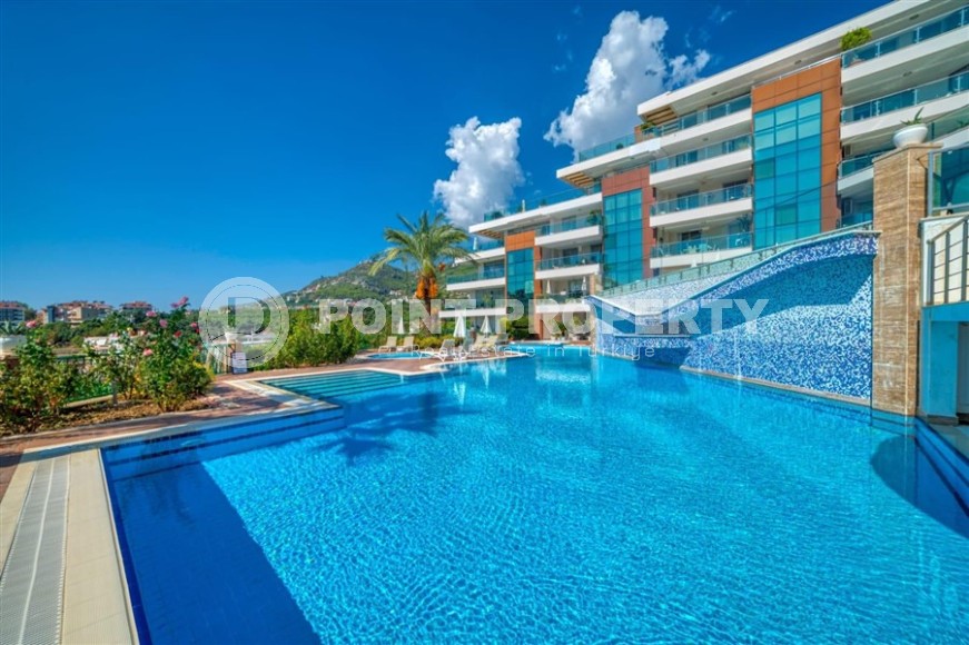 Современная квартира с тремя спальнями и большой открытой террасой, площадью 125 м2, в спокойном районе Аланьи - Джикджилли-id-7030-фото-20