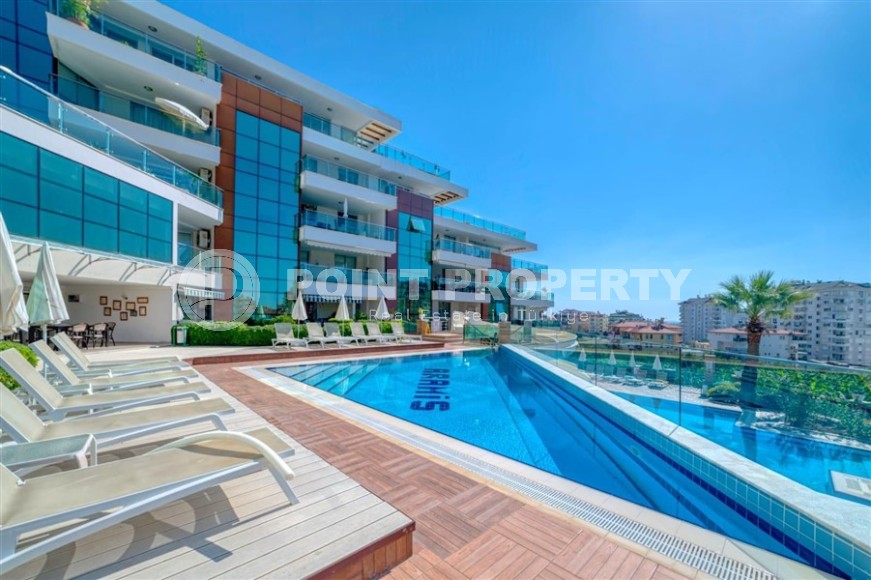 Современная квартира с тремя спальнями и большой открытой террасой, площадью 125 м2, в спокойном районе Аланьи - Джикджилли-id-7030-фото-21