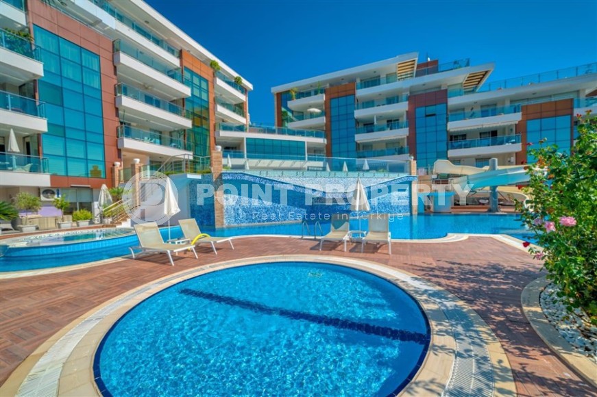 Современная квартира с тремя спальнями и большой открытой террасой, площадью 125 м2, в спокойном районе Аланьи - Джикджилли-id-7030-фото-22