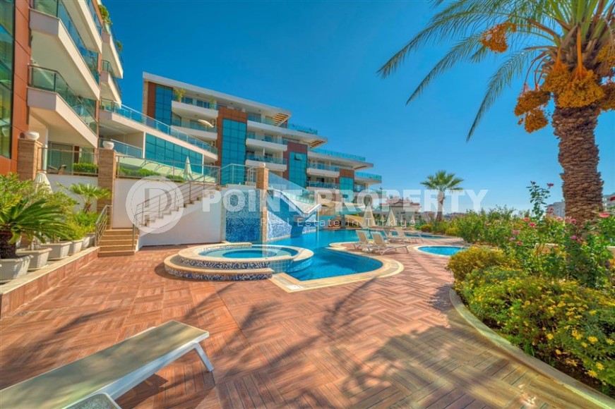 Современная квартира с тремя спальнями и большой открытой террасой, площадью 125 м2, в спокойном районе Аланьи - Джикджилли-id-7030-фото-23