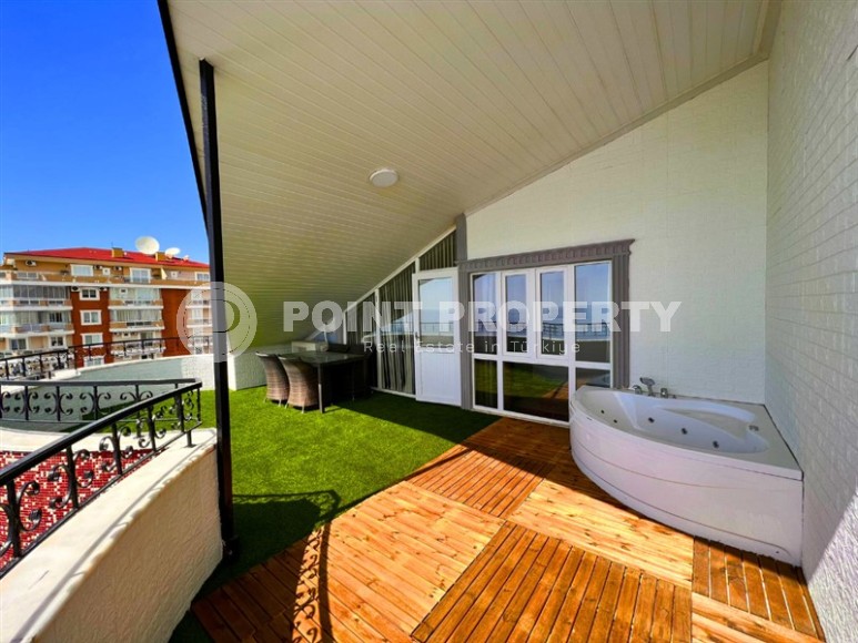 Панорамная двухуровневая квартира с джакузи на террасе с видом на море, в центре района Махмутлар-id-7034-фото-20