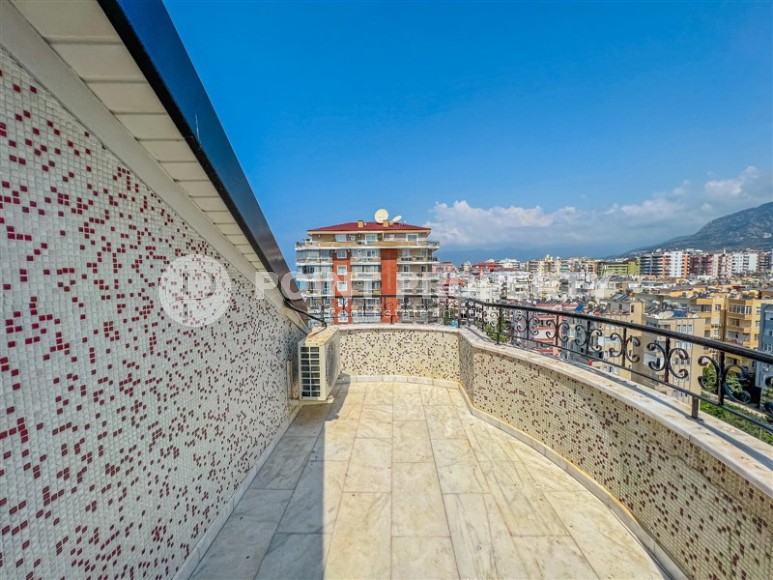 Панорамная двухуровневая квартира с джакузи на террасе с видом на море, в центре района Махмутлар-id-7034-фото-24