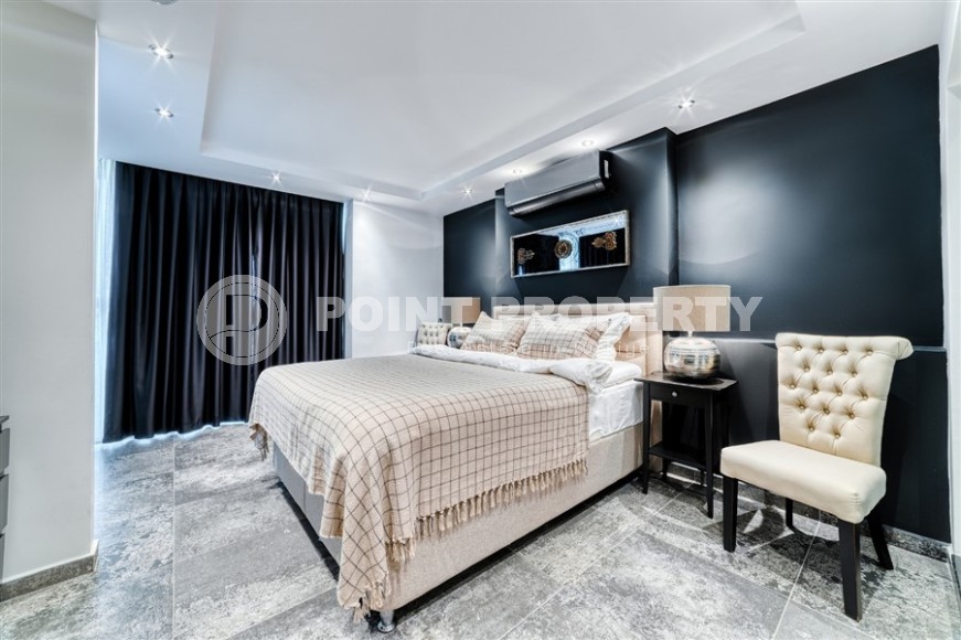 Stylish apartment with modern design 1300 meters from the sea, in a quiet area of Alanya - Cikcilli-id-7041-photo-6