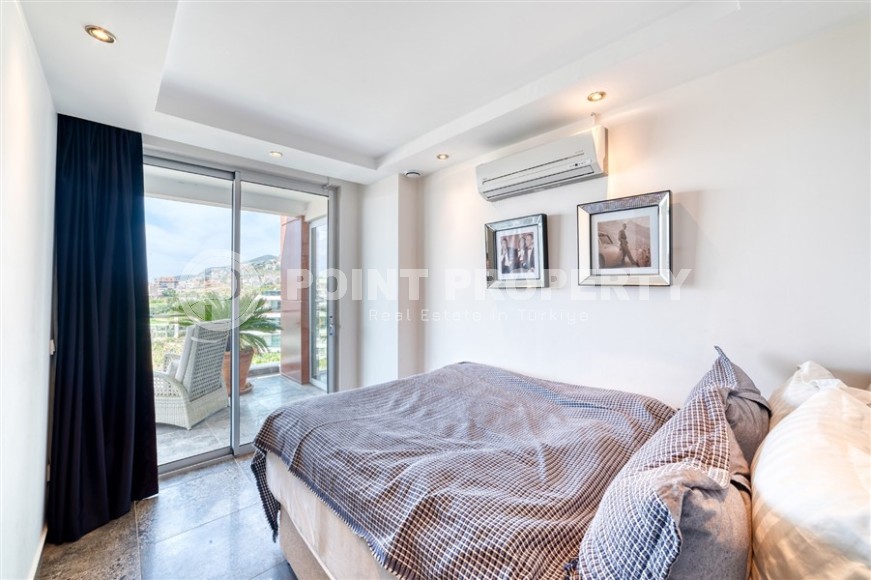 Stylish apartment with modern design 1300 meters from the sea, in a quiet area of Alanya - Cikcilli-id-7041-photo-9