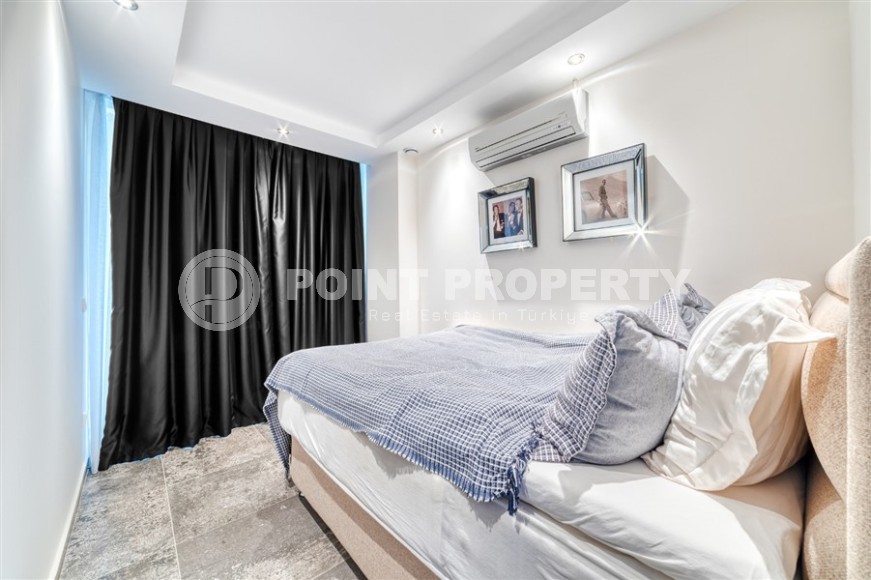 Stylish apartment with modern design 1300 meters from the sea, in a quiet area of Alanya - Cikcilli-id-7041-photo-10