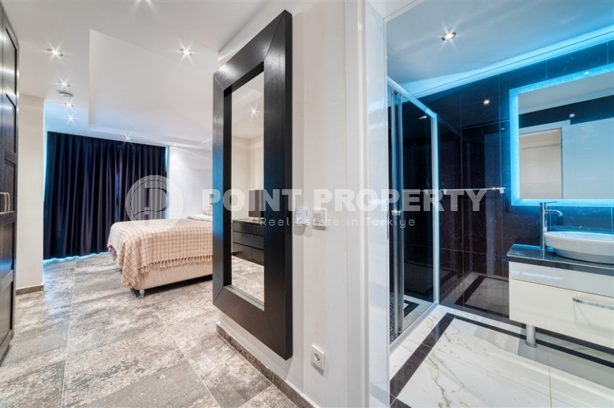 Stylish apartment with modern design 1300 meters from the sea, in a quiet area of Alanya - Cikcilli-id-7041-photo-11
