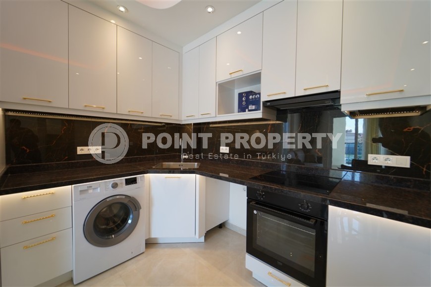 Новая квартира с мебелью и бытовой техникой в полутора километрах от моря, в зеленом, экологически чистом районе Аланьи - Газипаша-id-7045-фото-2