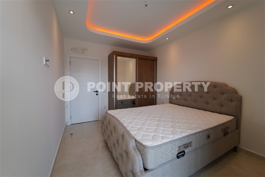 Новая квартира с мебелью и бытовой техникой в полутора километрах от моря, в зеленом, экологически чистом районе Аланьи - Газипаша-id-7045-фото-3