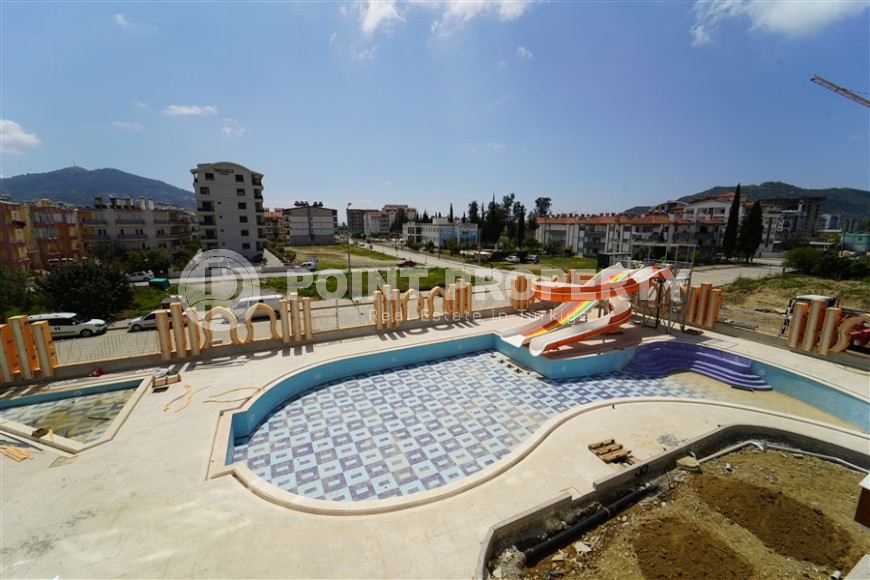 Новая квартира с мебелью и бытовой техникой в полутора километрах от моря, в зеленом, экологически чистом районе Аланьи - Газипаша-id-7045-фото-8