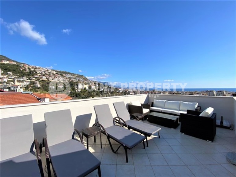 Panoramic duplex apartment with sea and mountain views, on the 3rd floor with attic in the center of Alanya-id-7051-photo-12
