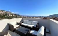Panoramic duplex apartment with sea and mountain views, on the 3rd floor with attic in the center of Alanya-id-7051-photo-13