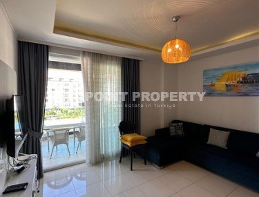 Comfortable 1+1 apartment 100 meters from the sea, in the center of the prestigious area of Alanya - Kestel-id-7053-photo-1
