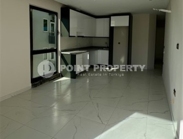 New apartment with fine finishing 150 meters from the sea, in the center of Alanya-id-7054-photo-1