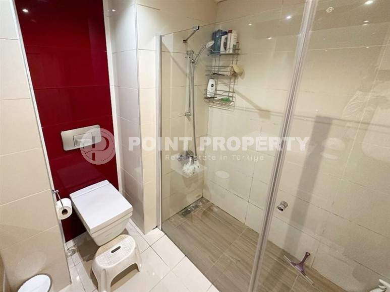 Modern apartment with comfortable furniture and all necessary appliances, one and a half kilometers from the sea, in the center of Alanya-id-7062-photo-10