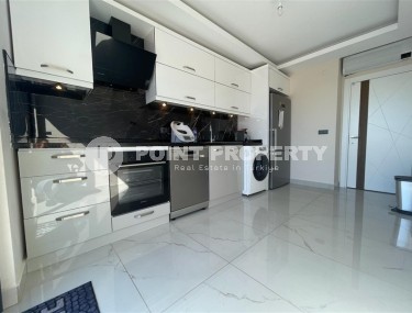 Modern apartment with high-quality renovation two kilometers from the sea, in a prestigious area of Alanya - Upper Oba-id-7069-photo-2