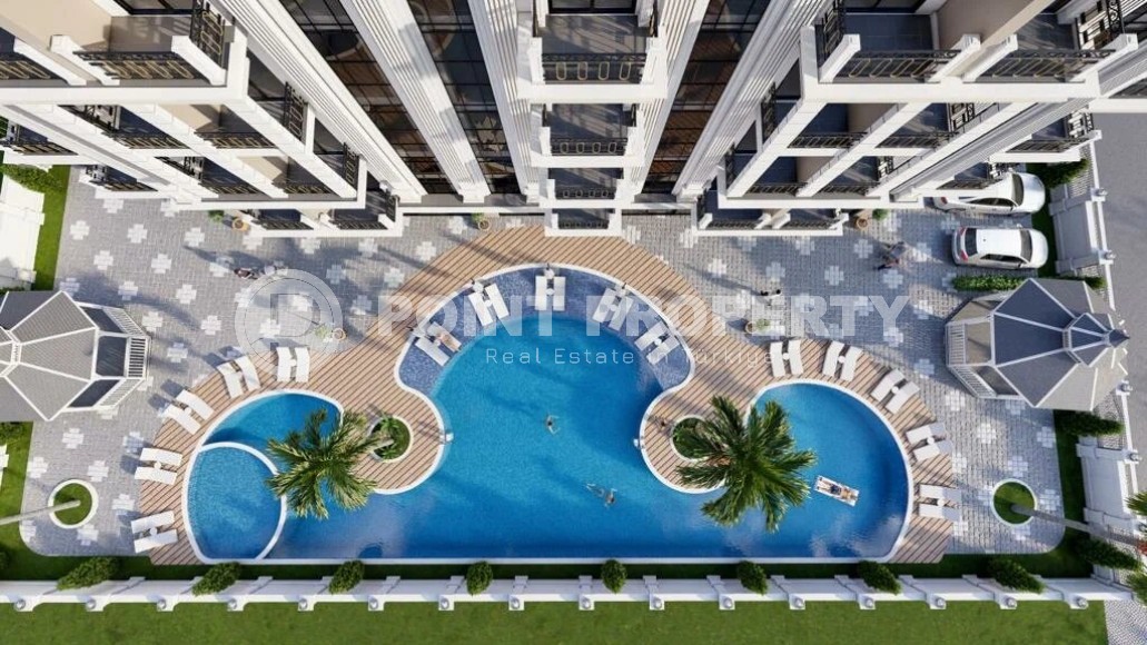 Недорогая квартира в жилом комплексе на завершающем этапе строительства, в перспективном районе Аланьи - Авсаллар-id-7074-фото-6