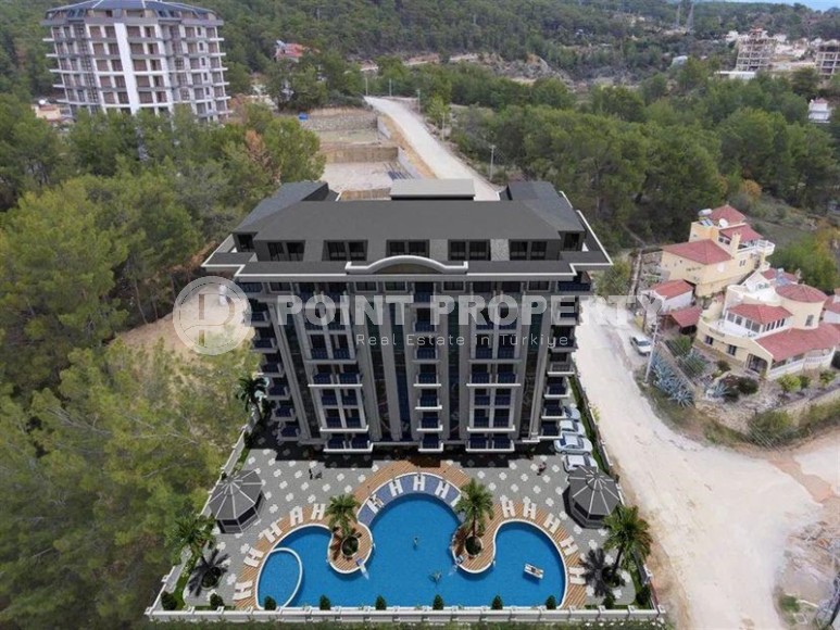 Недорогая квартира в жилом комплексе на завершающем этапе строительства, в перспективном районе Аланьи - Авсаллар-id-7074-фото-7