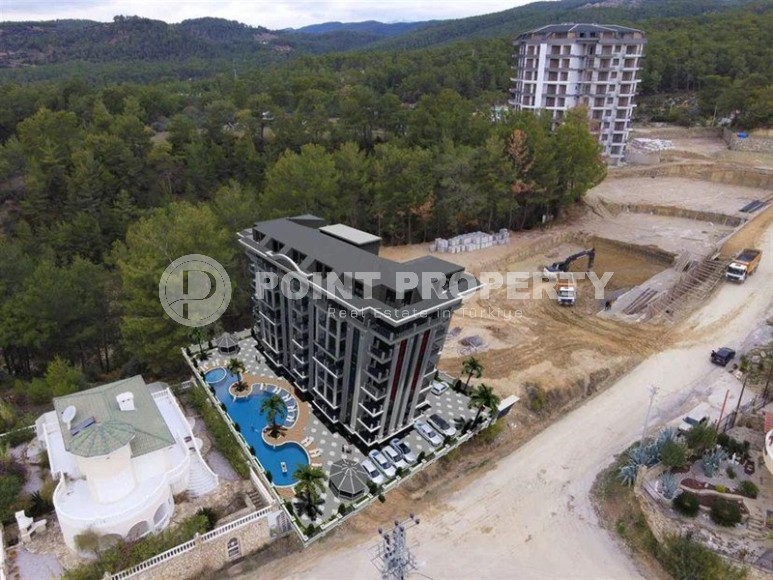 Недорогая квартира в жилом комплексе на завершающем этапе строительства, в перспективном районе Аланьи - Авсаллар-id-7074-фото-8