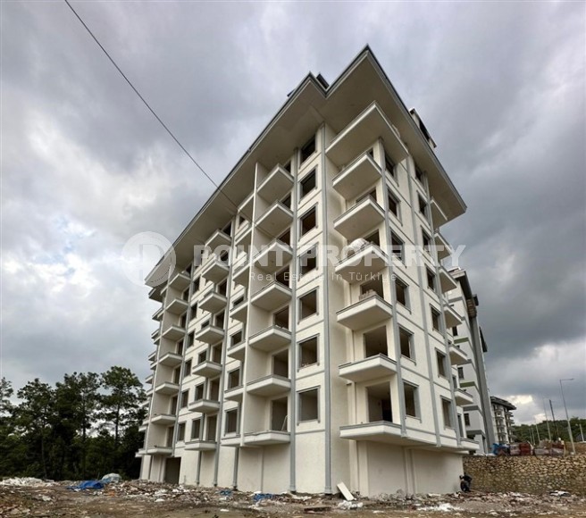Недорогая квартира в жилом комплексе на завершающем этапе строительства, в перспективном районе Аланьи - Авсаллар-id-7074-фото-9