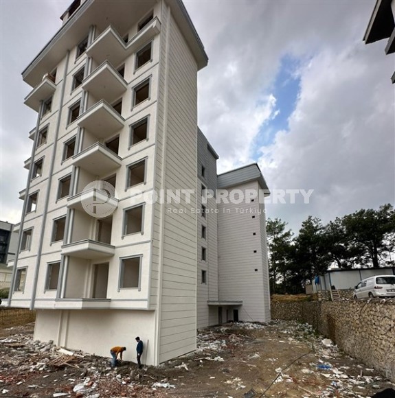 Недорогая квартира в жилом комплексе на завершающем этапе строительства, в перспективном районе Аланьи - Авсаллар-id-7074-фото-10