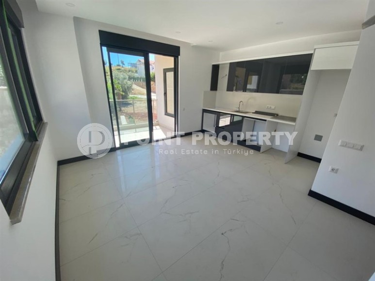 Новая квартира с качественной чистовой отделкой в 500 метрах от моря, в центре престижного района Аланьи - Кестель-id-7076-фото-2