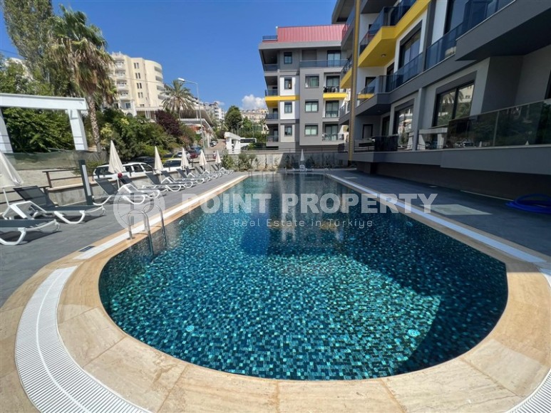 Новая квартира с качественной чистовой отделкой в 500 метрах от моря, в центре престижного района Аланьи - Кестель-id-7076-фото-17