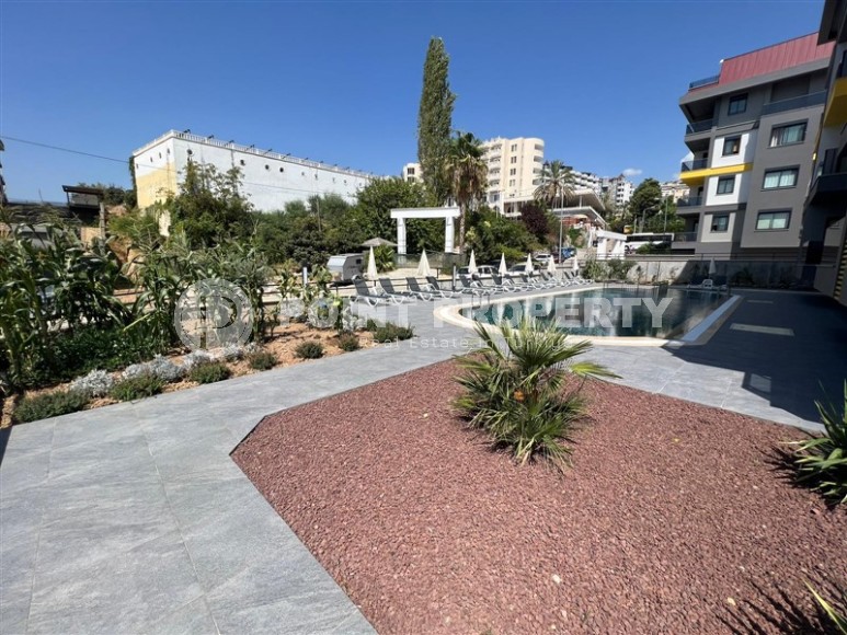 Новая квартира с качественной чистовой отделкой в 500 метрах от моря, в центре престижного района Аланьи - Кестель-id-7076-фото-18