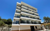 Apartment in a commissioned residential complex in a promising area of Alanya - Avsallar, two kilometers from the sea-id-7086-photo-1