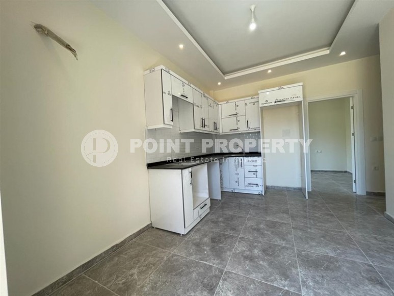 Apartment in a commissioned residential complex in a promising area of Alanya - Avsallar, two kilometers from the sea-id-7086-photo-2