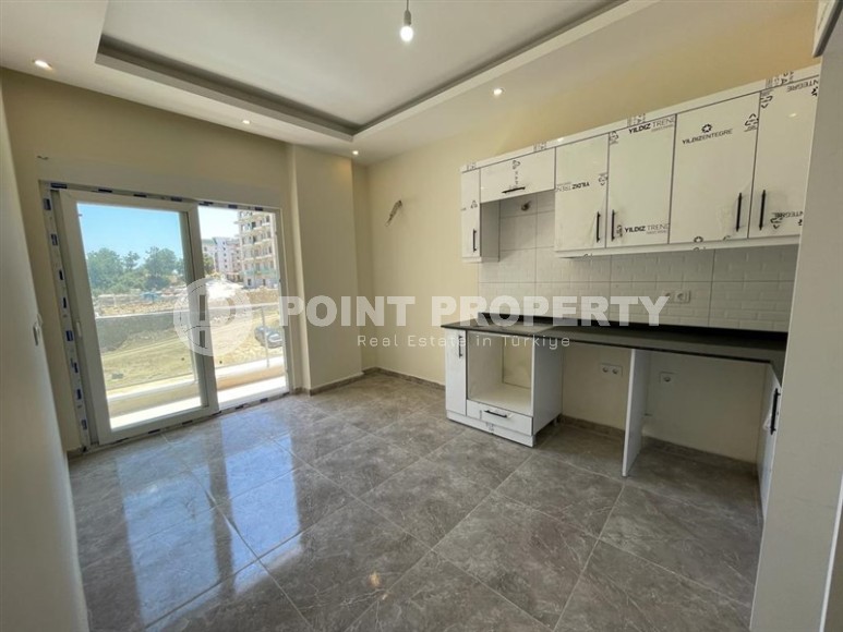 Apartment in a commissioned residential complex in a promising area of Alanya - Avsallar, two kilometers from the sea-id-7086-photo-3
