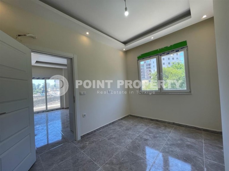 Apartment in a commissioned residential complex in a promising area of Alanya - Avsallar, two kilometers from the sea-id-7086-photo-4