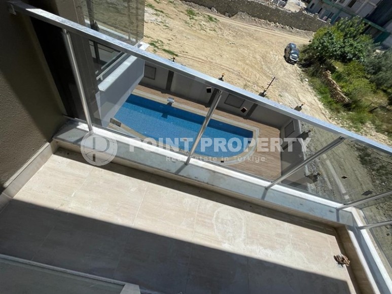 Apartment in a commissioned residential complex in a promising area of Alanya - Avsallar, two kilometers from the sea-id-7086-photo-8
