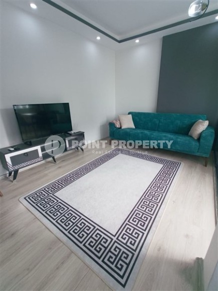 Готовая к проживанию квартира 1+1 в 50 метрах от пляжа, в центре туристического района Мерсина - Тедже-id-7089-фото-1