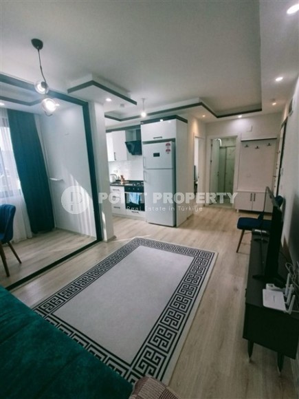 Готовая к проживанию квартира 1+1 в 50 метрах от пляжа, в центре туристического района Мерсина - Тедже-id-7089-фото-3