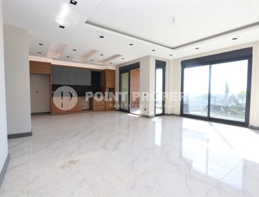 Просторная двухуровневая квартира с собственным садом в элитном районе Аланьи - Тепе-id-7090-фото-2