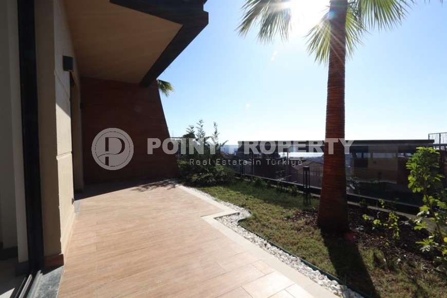 Просторная двухуровневая квартира с собственным садом в элитном районе Аланьи - Тепе-id-7090-фото-16