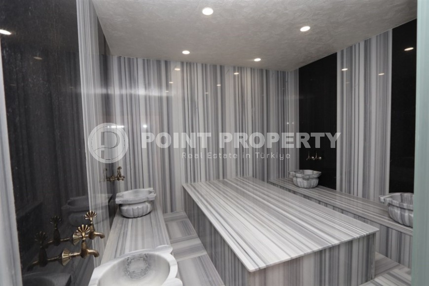 Просторная двухуровневая квартира с собственным садом в элитном районе Аланьи - Тепе-id-7090-фото-21