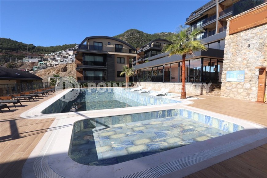 Просторная двухуровневая квартира с собственным садом в элитном районе Аланьи - Тепе-id-7090-фото-24