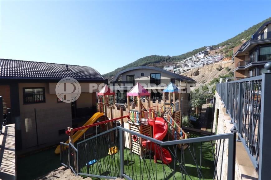 Просторная двухуровневая квартира с собственным садом в элитном районе Аланьи - Тепе-id-7090-фото-26