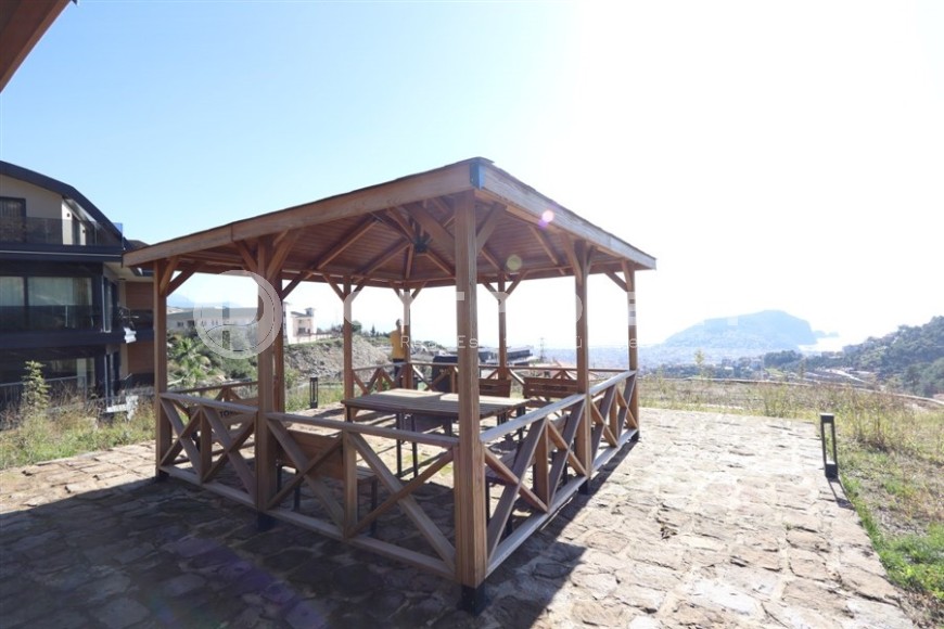 Просторная двухуровневая квартира с собственным садом в элитном районе Аланьи - Тепе-id-7090-фото-27