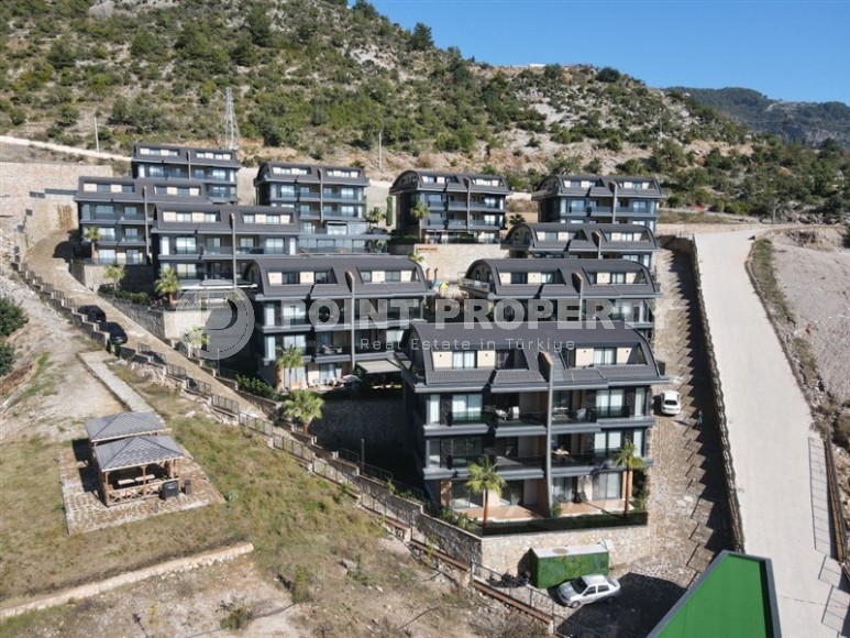 Просторная двухуровневая квартира с собственным садом в элитном районе Аланьи - Тепе-id-7090-фото-28