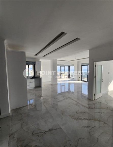 Панорамная квартира с видом на море и гору Кале, на 4-м этаже с мансардой в престижном районе Аланьи - Хасбахче-id-7094-фото-3