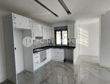 Панорамная квартира с видом на море и гору Кале, на 4-м этаже с мансардой в престижном районе Аланьи - Хасбахче-id-7094-фото-4