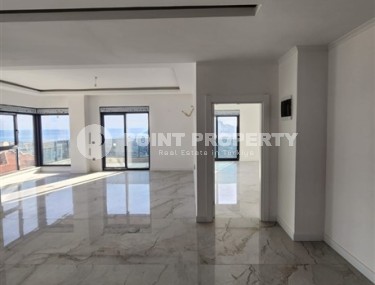 Панорамная квартира с видом на море и гору Кале, на 4-м этаже с мансардой в престижном районе Аланьи - Хасбахче-id-7094-фото-5