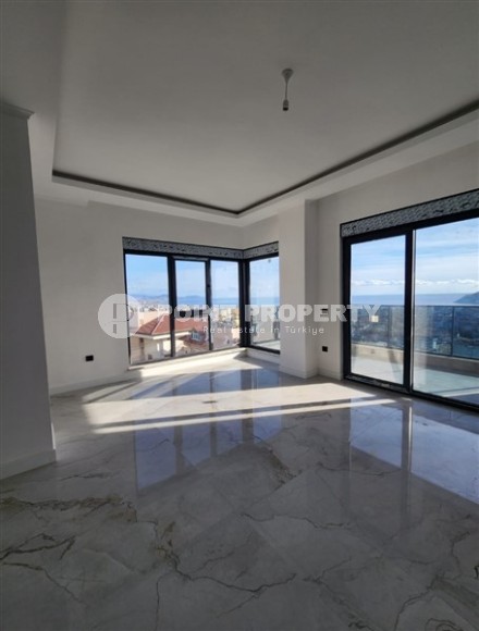 Панорамная квартира с видом на море и гору Кале, на 4-м этаже с мансардой в престижном районе Аланьи - Хасбахче-id-7094-фото-6