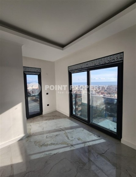 Панорамная квартира с видом на море и гору Кале, на 4-м этаже с мансардой в престижном районе Аланьи - Хасбахче-id-7094-фото-7