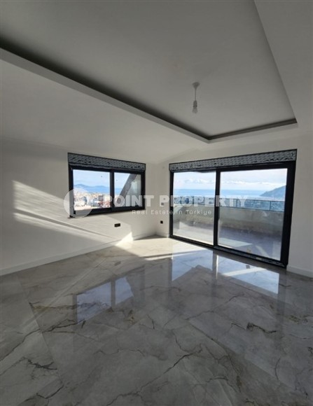 Панорамная квартира с видом на море и гору Кале, на 4-м этаже с мансардой в престижном районе Аланьи - Хасбахче-id-7094-фото-8