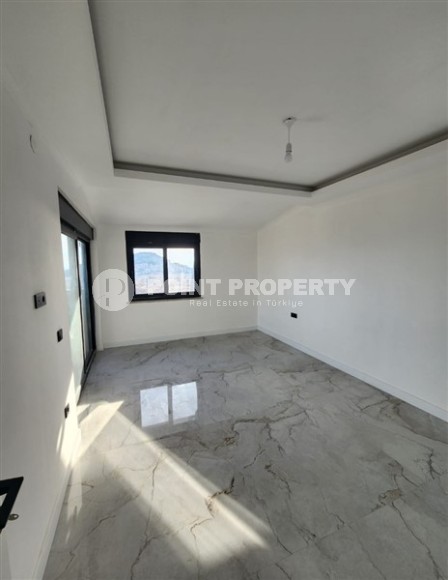 Панорамная квартира с видом на море и гору Кале, на 4-м этаже с мансардой в престижном районе Аланьи - Хасбахче-id-7094-фото-10