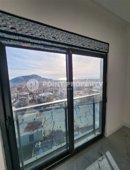 Панорамная квартира с видом на море и гору Кале, на 4-м этаже с мансардой в престижном районе Аланьи - Хасбахче-id-7094-фото-13